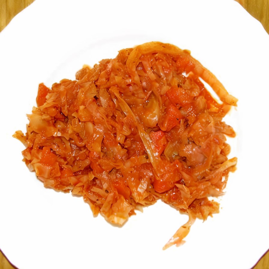 Капуста, тушеная с томатом и грудинкой