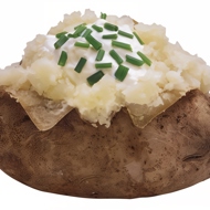 Запеченные половинки картофеля с сыром грюйер и шнитт-луком