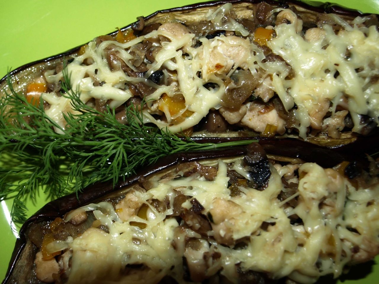 Eggplants Stuffed with Mushrooms, Chicken, and Bell Peppers