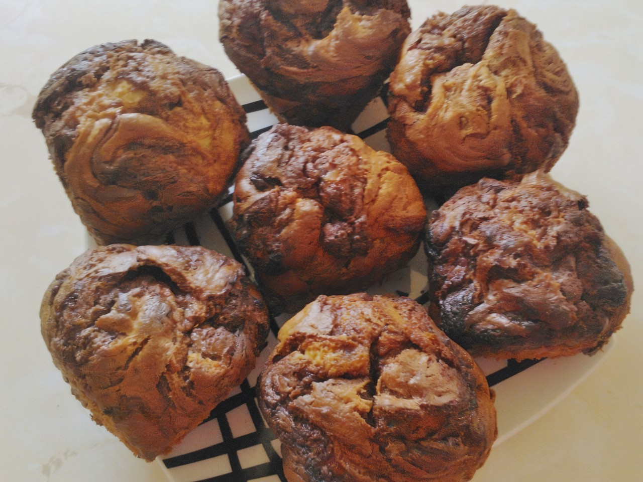 Banana Muffins with Chocolate Spread and Hazelnuts