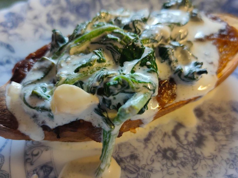 Baked Sweet Potatoes with Spinach and Cream Sauce