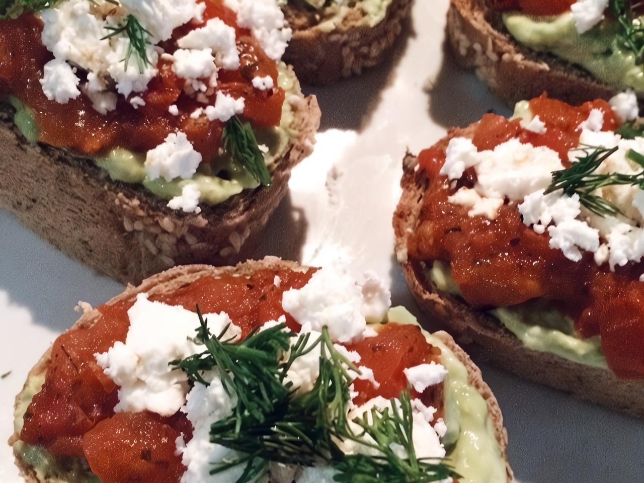 Bruschetta with Avocado Paste, Tomatoes, and Feta Cheese