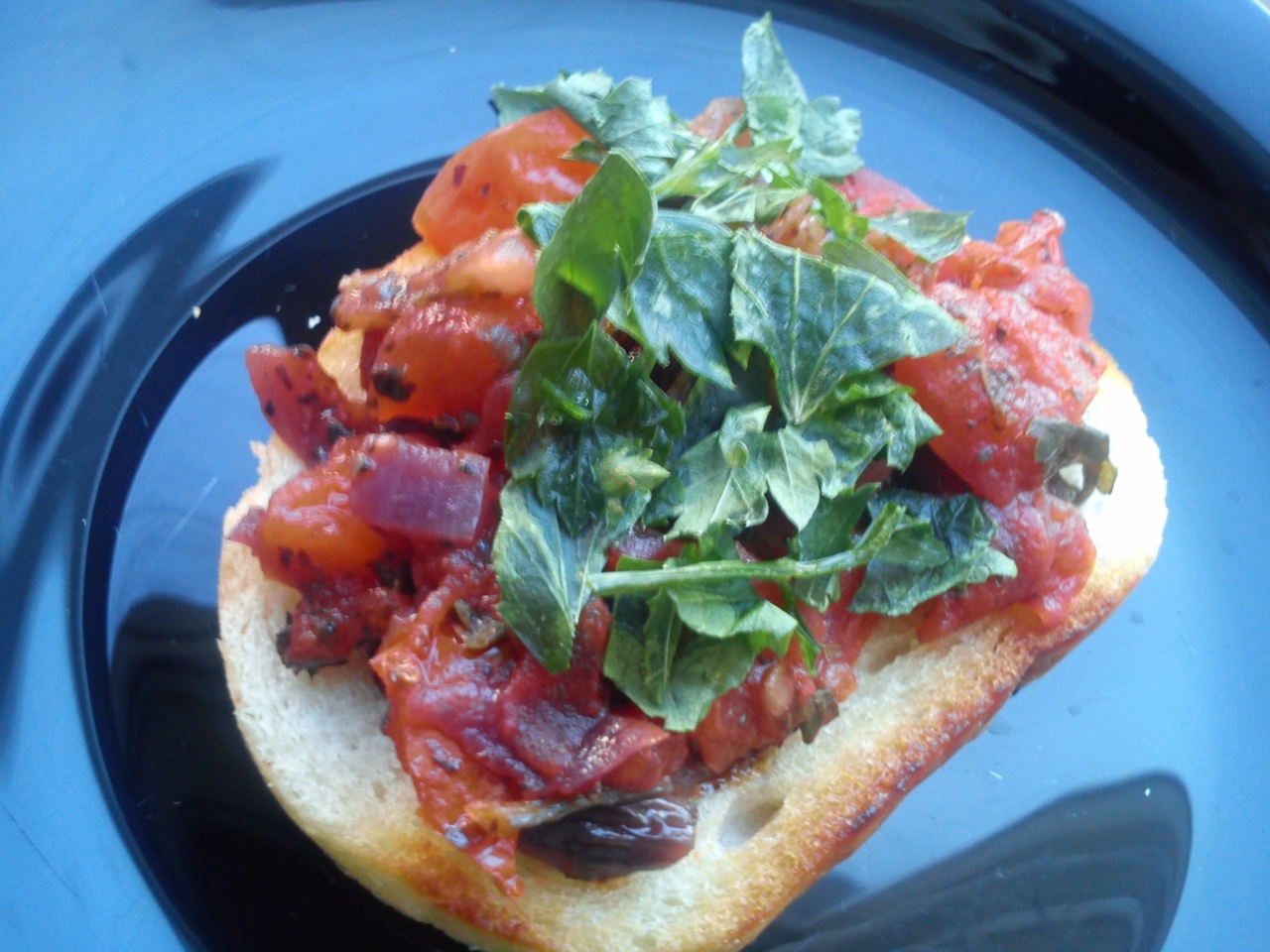 Bruschetta with Tomatoes, Red Onion, and Basil