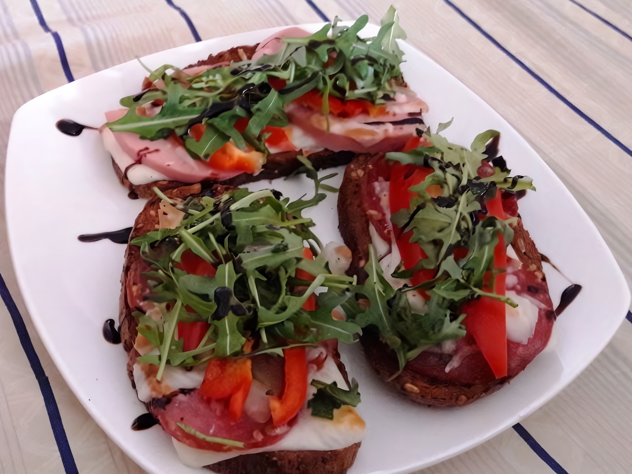 Bruschetta with Salami, Arugula, Mozzarella, and Balsamic