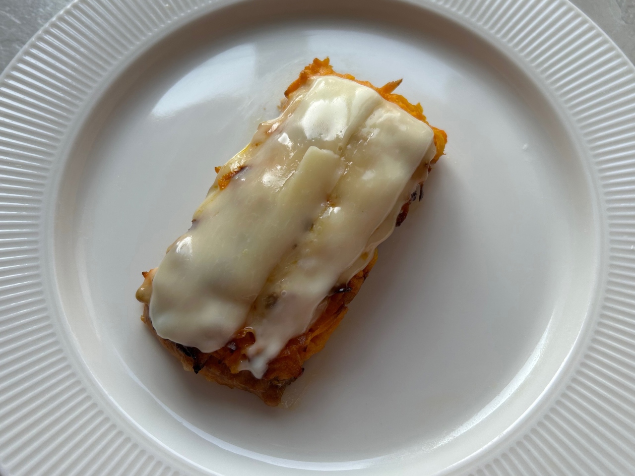 Coho Salmon under Carrot-Onion Topping