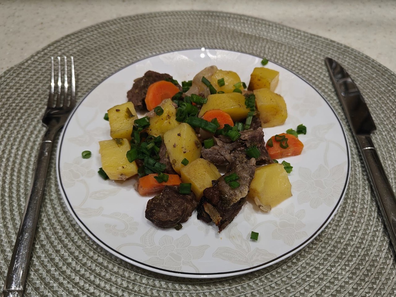 Beef with Potatoes and Parsley in a Sleeve