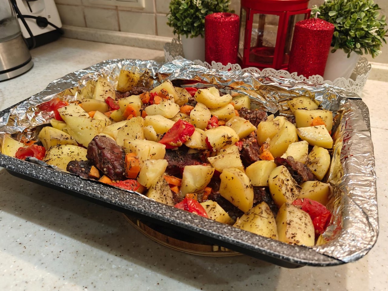 Beef with Potatoes and Tomatoes in the Oven