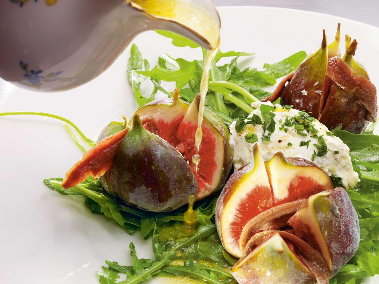Fig with Anchovies, Cream Cheese, Honey Sauce, and Arugula