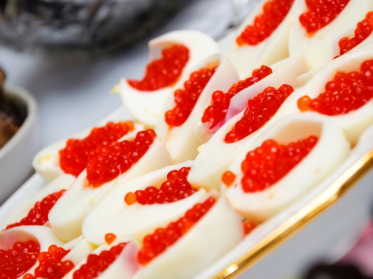 Eggs Stuffed with Caviar, Topped with Mayonnaise
