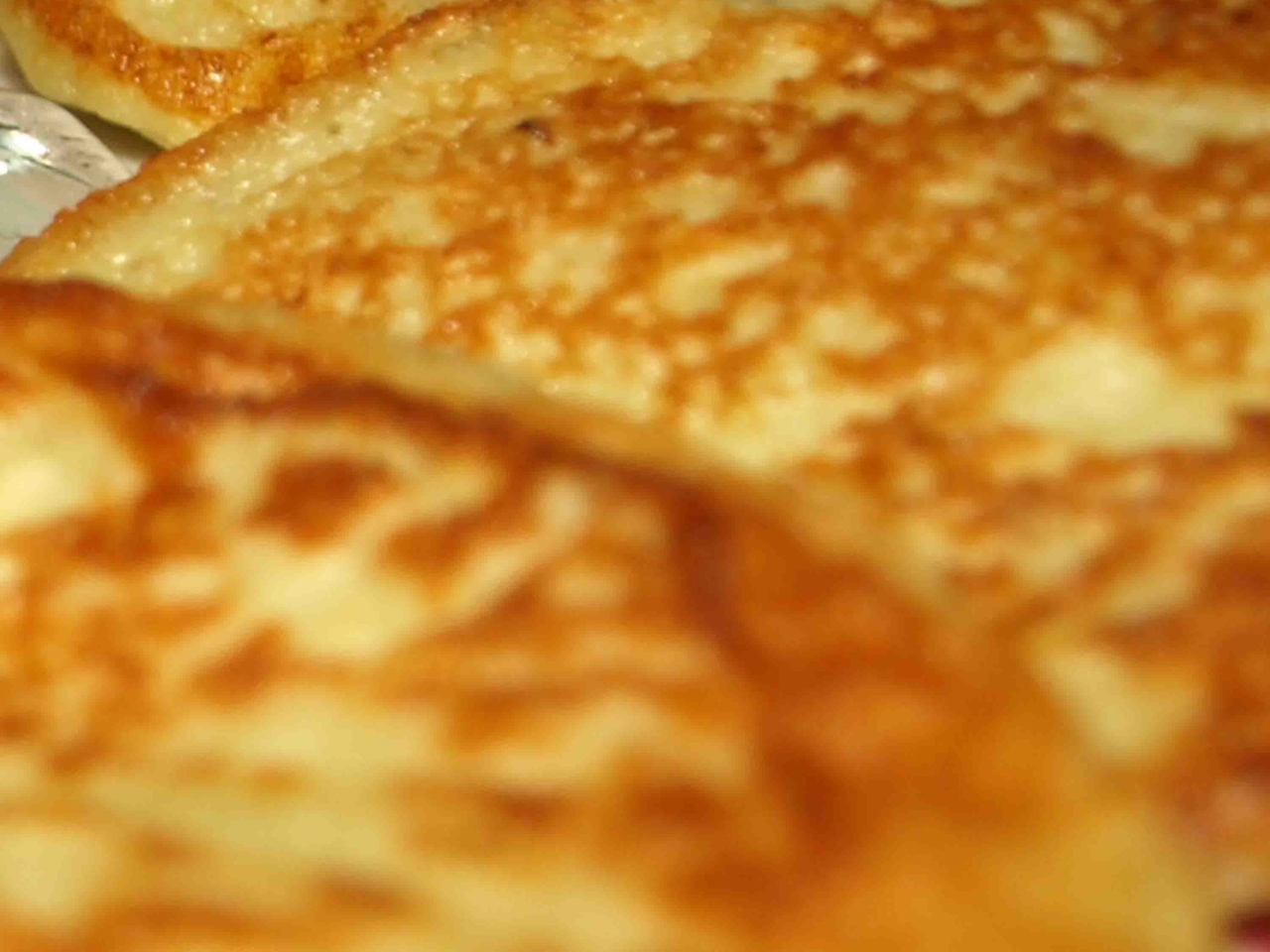 Potato Pancakes with Onion and Sour Cream Sauce