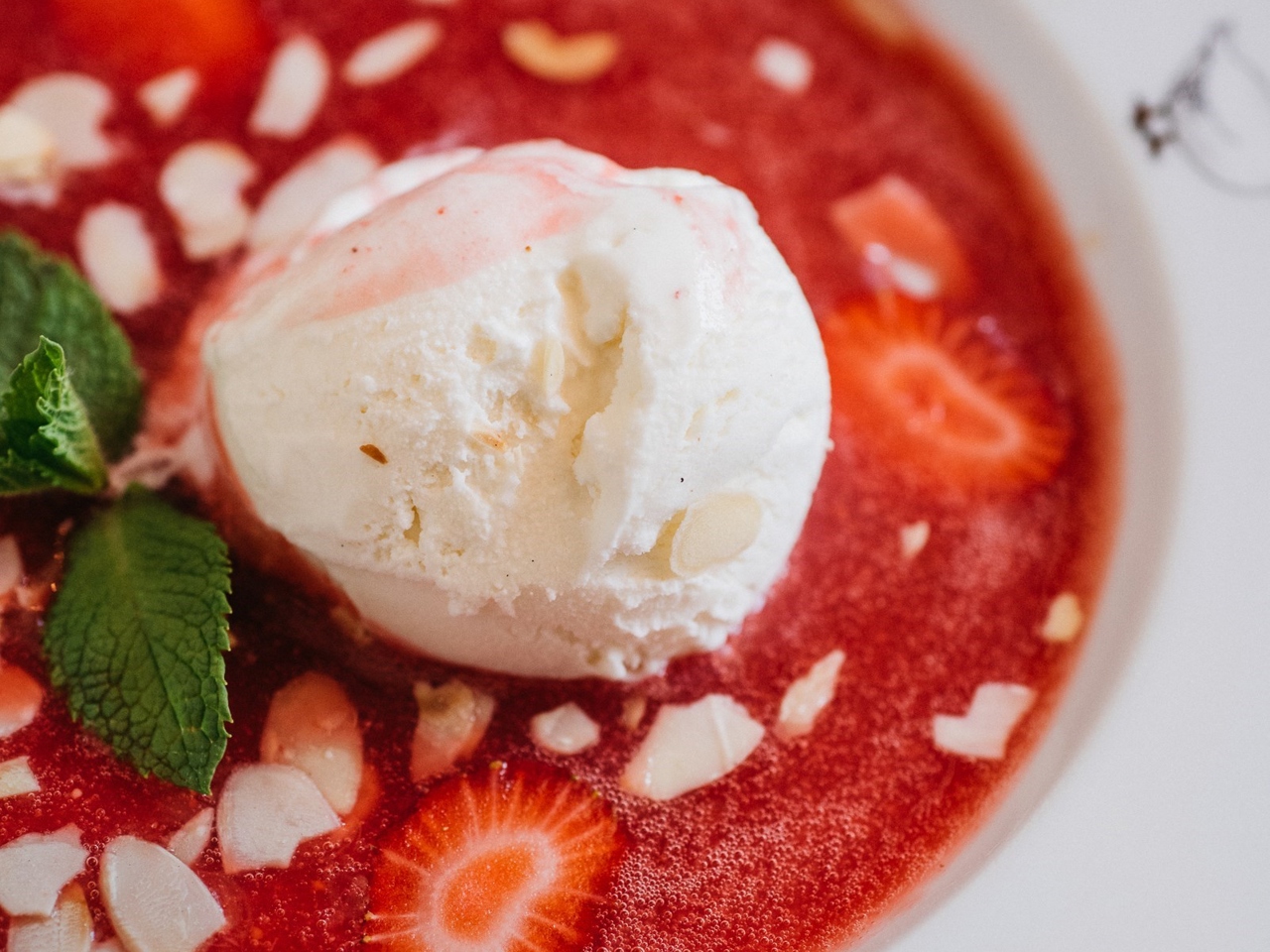 Strawberry Soup with Vanilla Ice Cream and Almond Petals