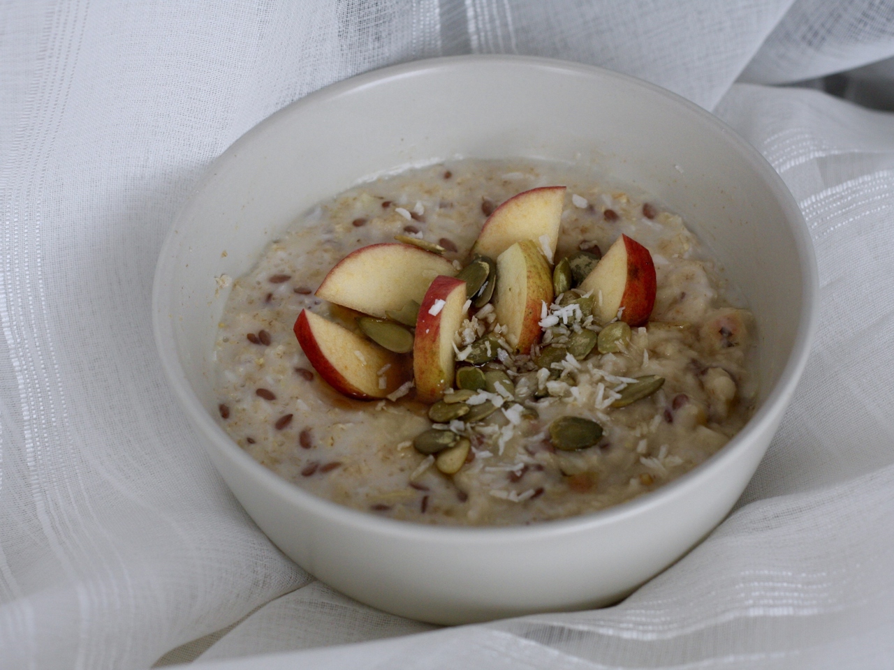 Coconut Oatmeal with Apple and Maple Syrup