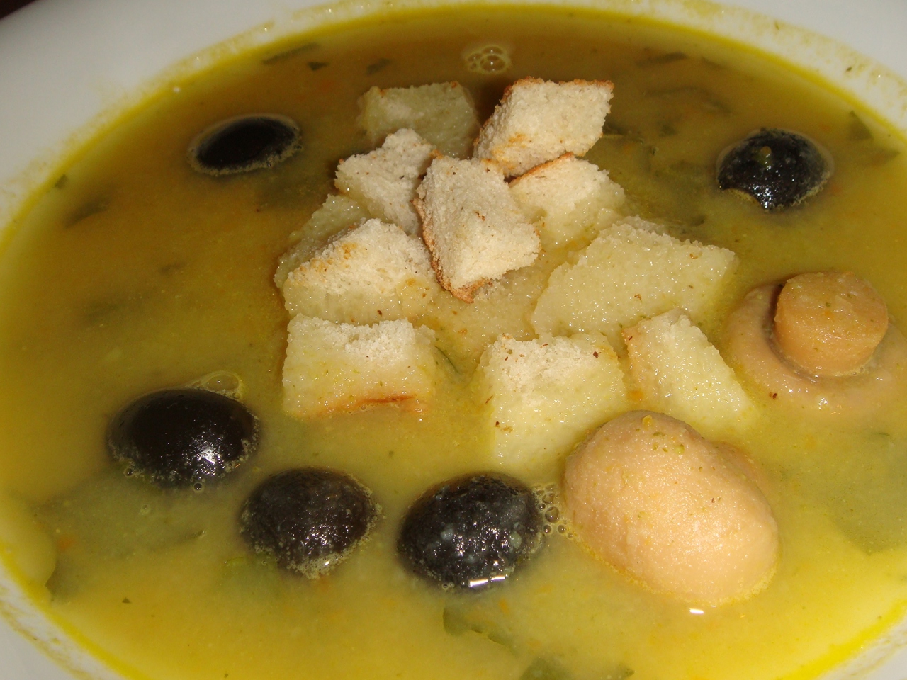 Cream Soup with Olives, Mushrooms, Potatoes, and Nutmeg