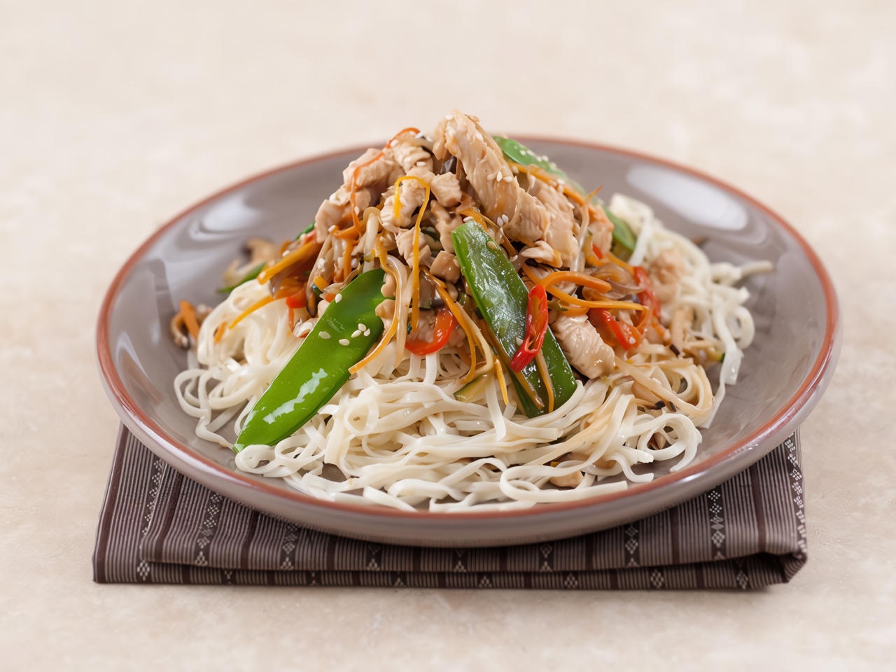Chicken Stir-Fry with Vegetables on Egg Noodles