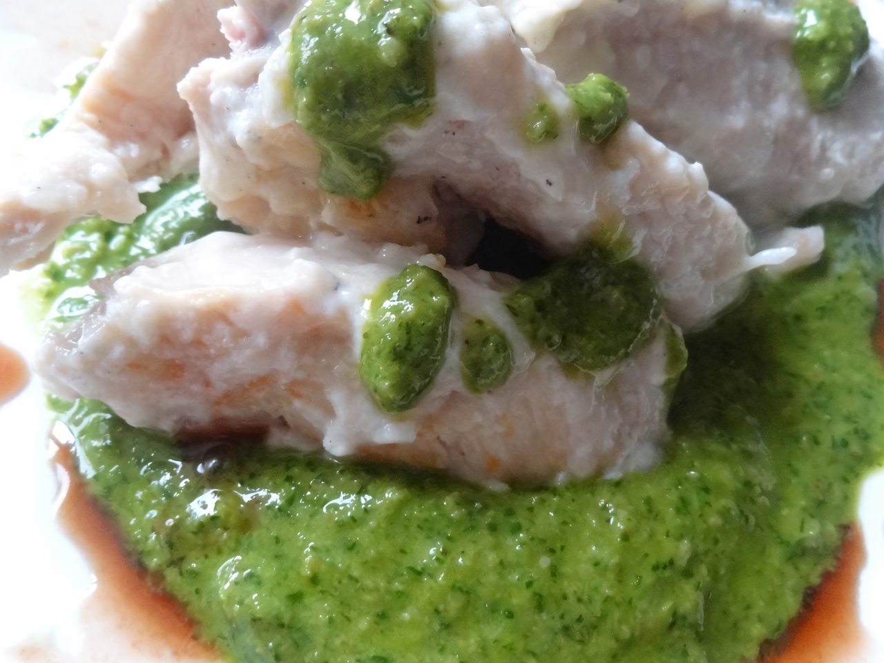 Chicken Breasts in Creamy Lemon Sauce on a Bed of Pesto Sauce