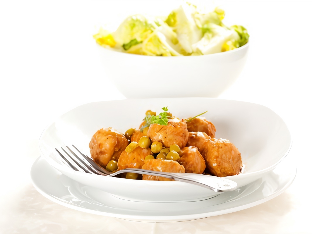 Chicken Cutlets in Wine Sauce with Mushrooms and Peas