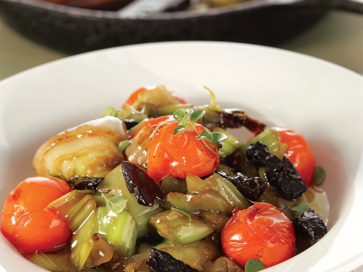Leeks Stewed with Prunes and Cherry Tomatoes