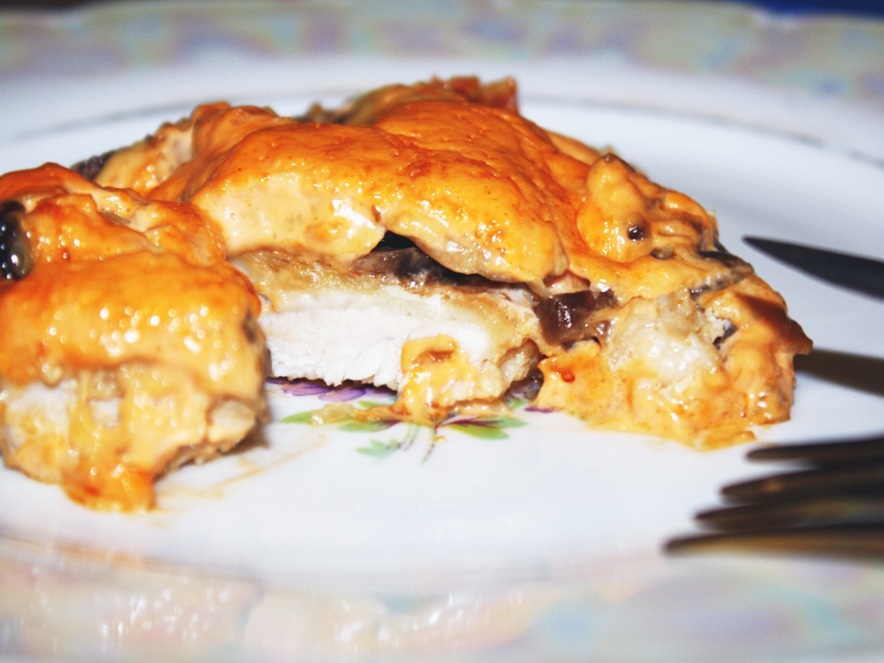 Tender Pork with Mushrooms in Cheese Sauce