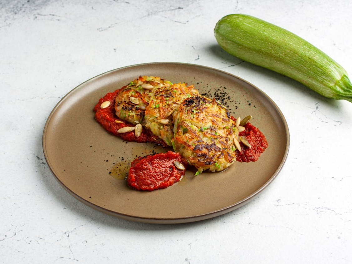 Vegetable Pancakes in Tomato Sauce with Pumpkin Seeds