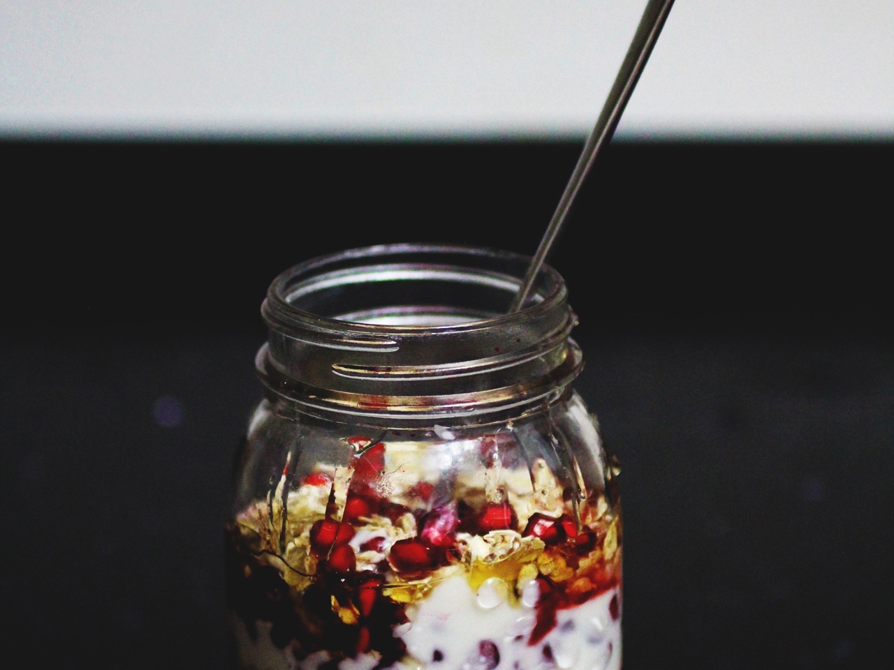 Oatmeal Breakfast with Pomegranate Seeds in a Jar