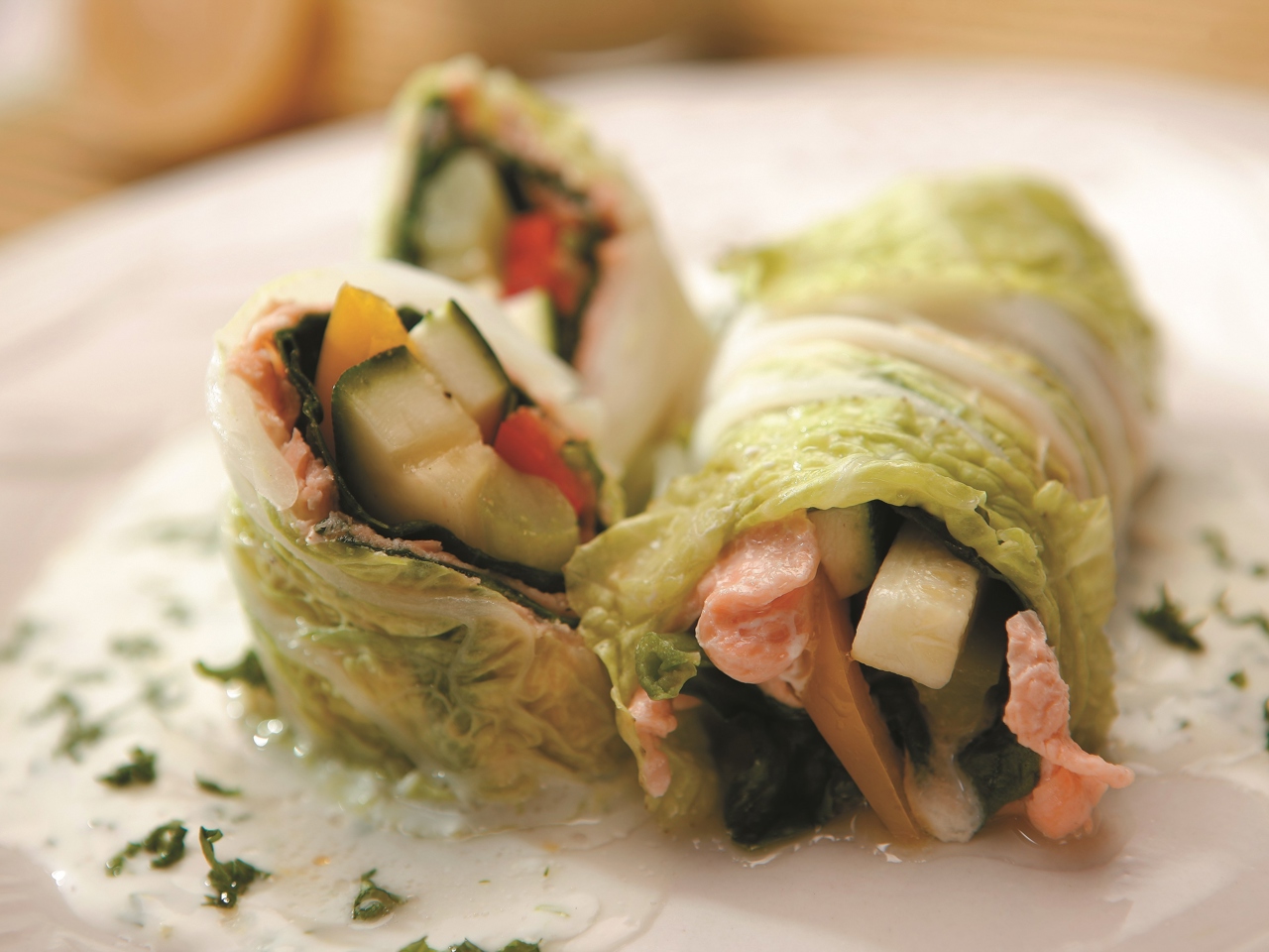 Steamed Salmon Rolls with Vegetables and Herbs in Natural Yogurt Sauce