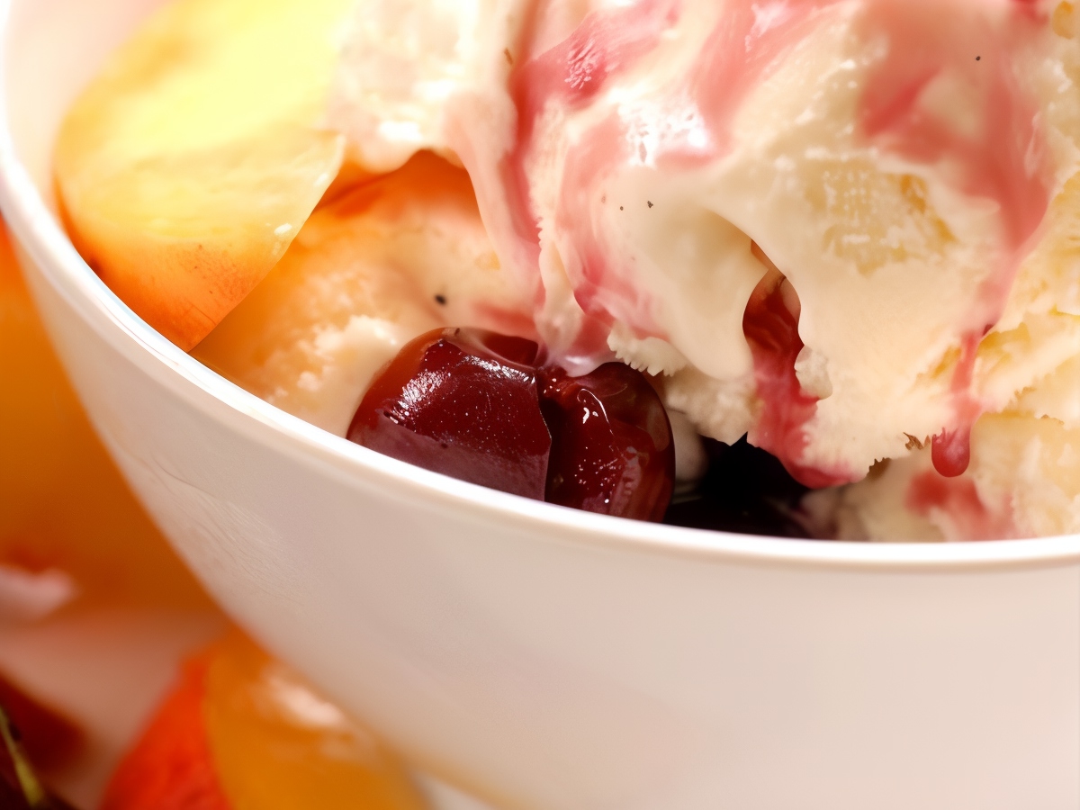 Peaches with Ice Cream in Berry Sauce