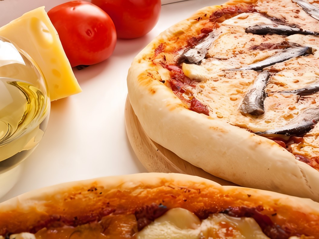 Pizza with Yeast Dough, Tomatoes, and Anchovies