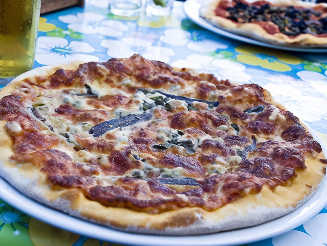 Pizza with Sardines, Onions, and Tomatoes