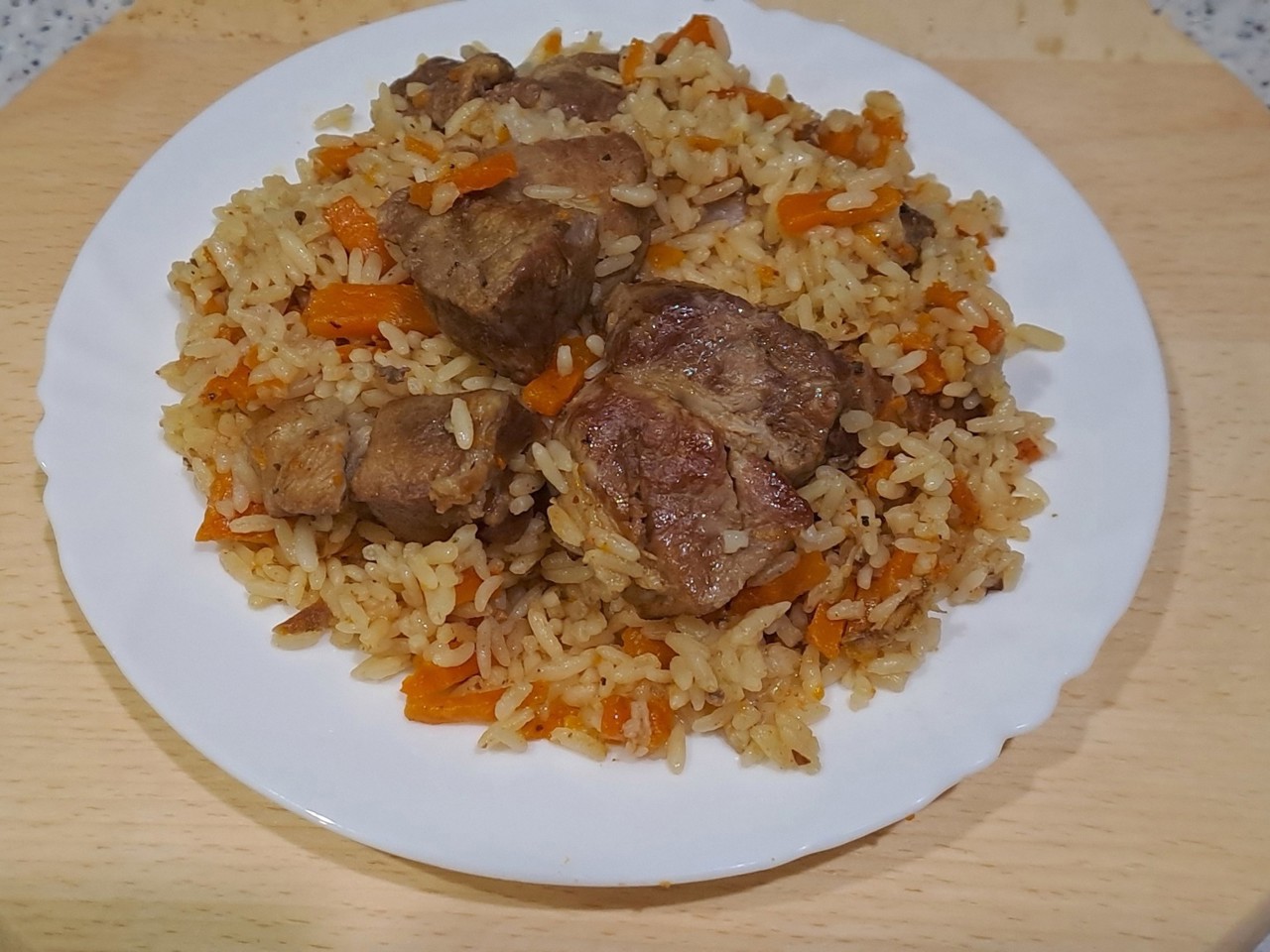 Pork Neck Pilaf in a Skillet