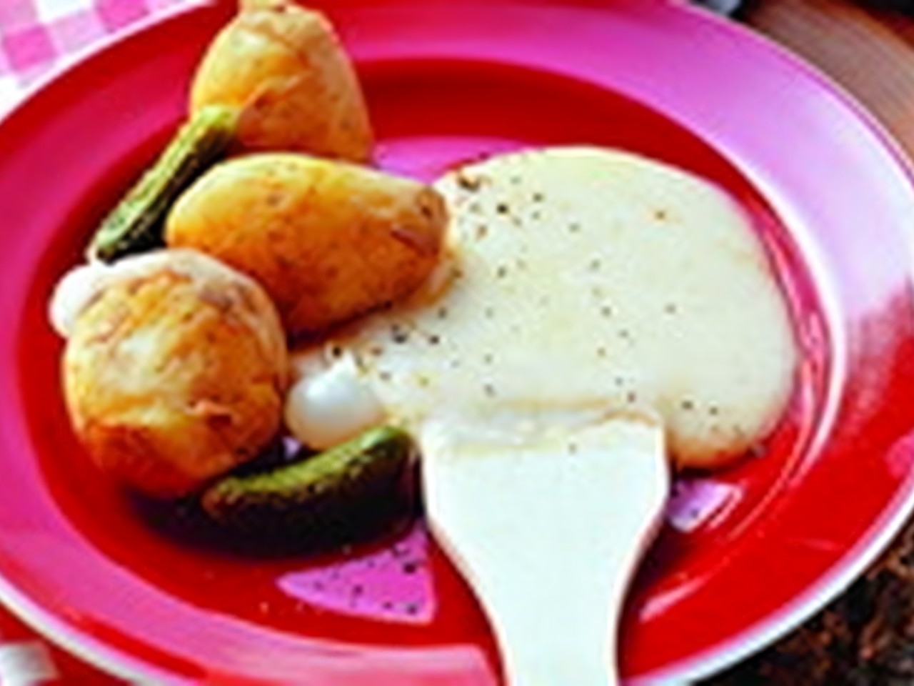 Raclette with Cheese, Potatoes, Pickles, and Bread