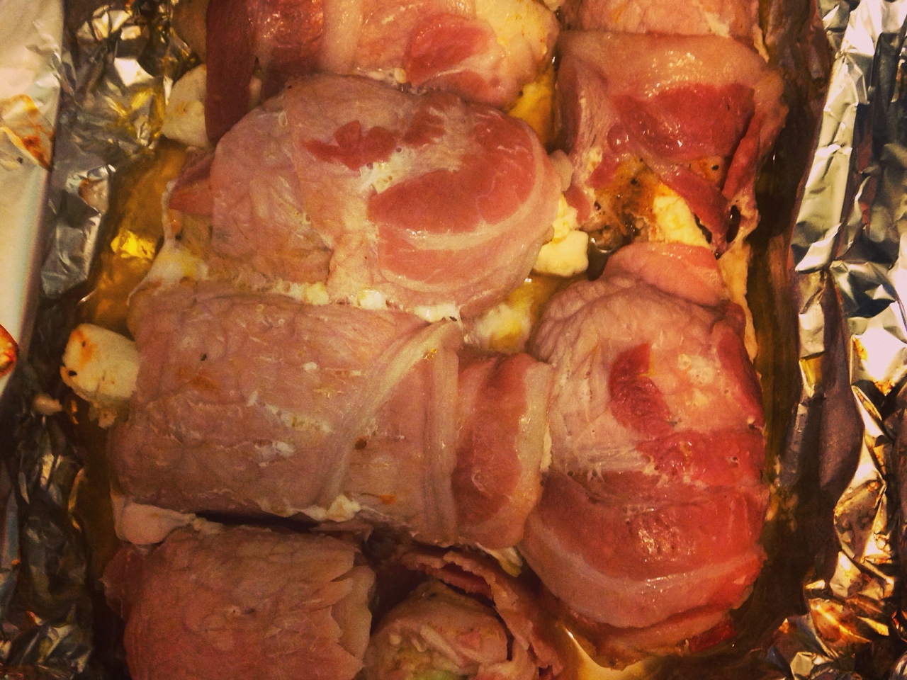 Chicken Breast Rolls Wrapped in Bacon with Feta Cheese and Tomatoes