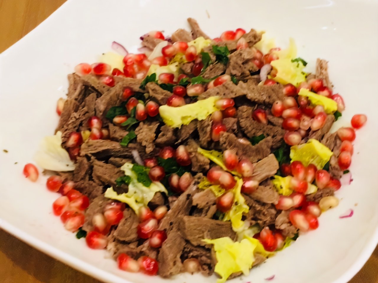 Meat Salad with Onions and Pomegranate Seeds