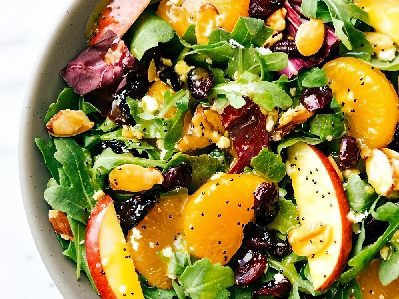 Salad with Almonds, Mandarins, Apples, Orange Dressing, and Poppy Seeds