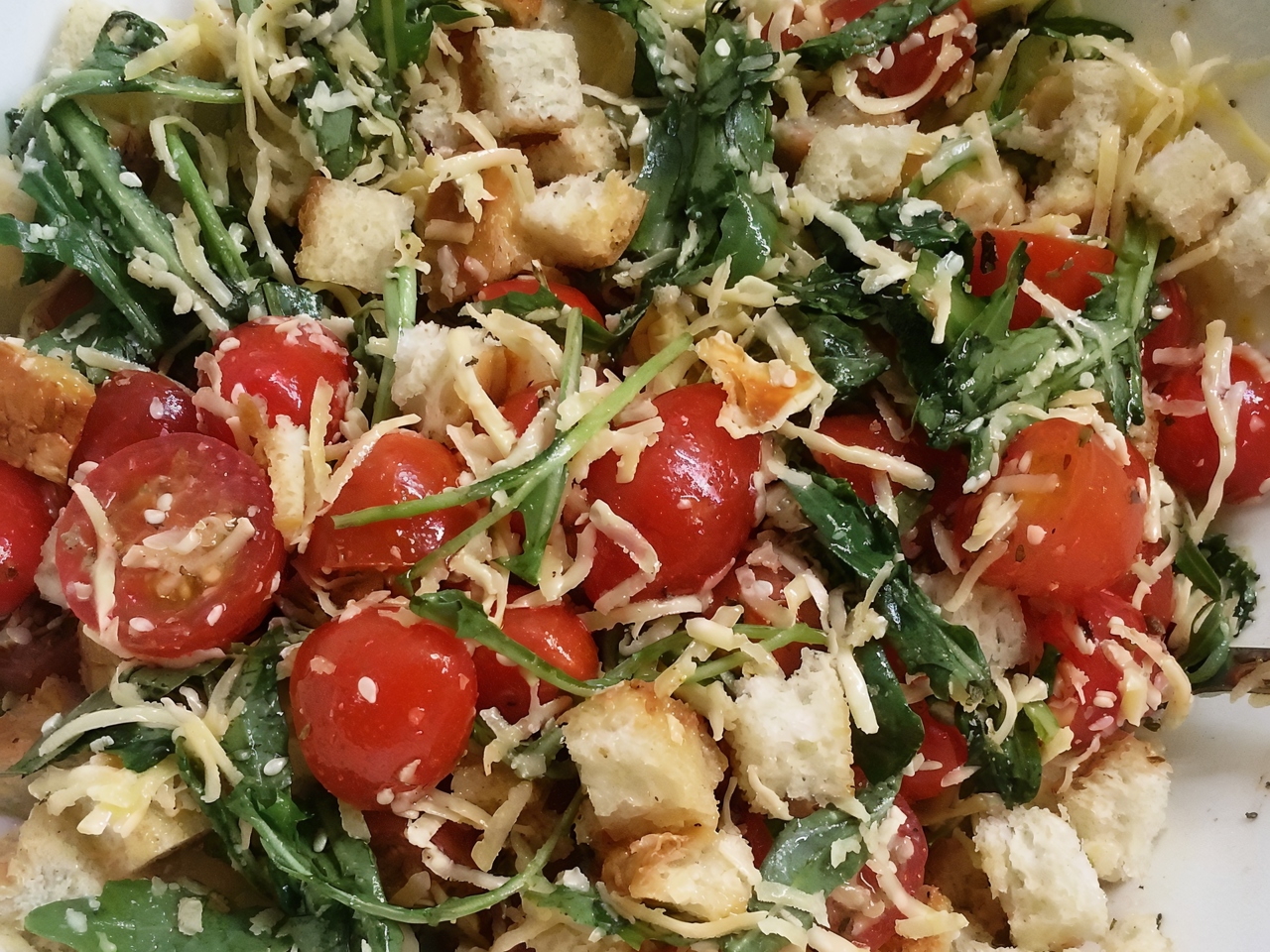 Arugula Salad with Cherry Tomatoes, Croutons, and Sesame