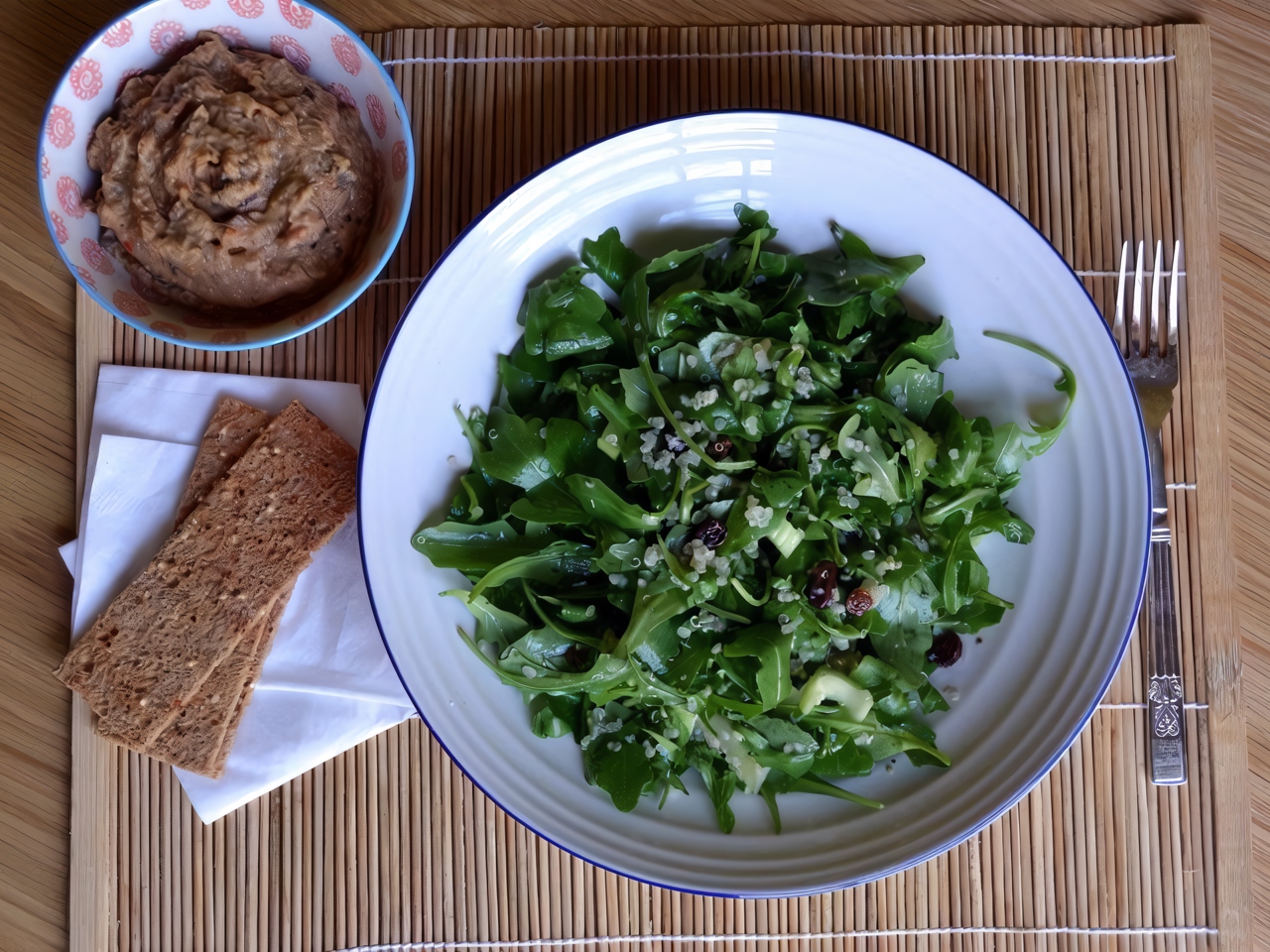 Arugula Salad with Celery, Raisins, and Quinoa