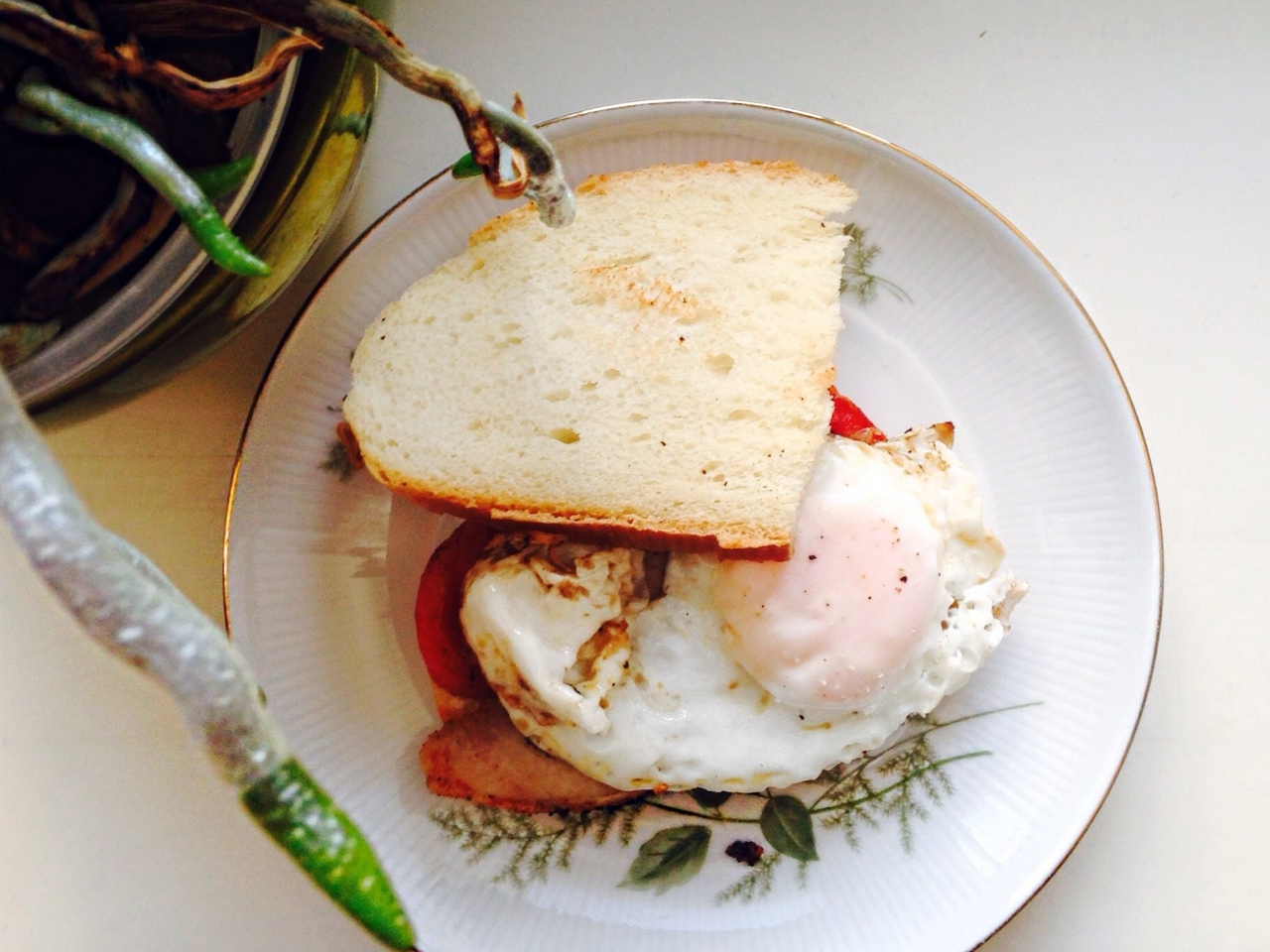 Sandwich with Fried Egg, Ham, and Tomatoes