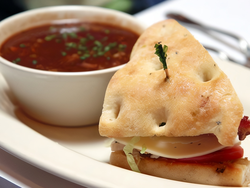 Focaccia Sandwiches with Arugula, Mozzarella, Pickled Red Onion, and Tomatoes