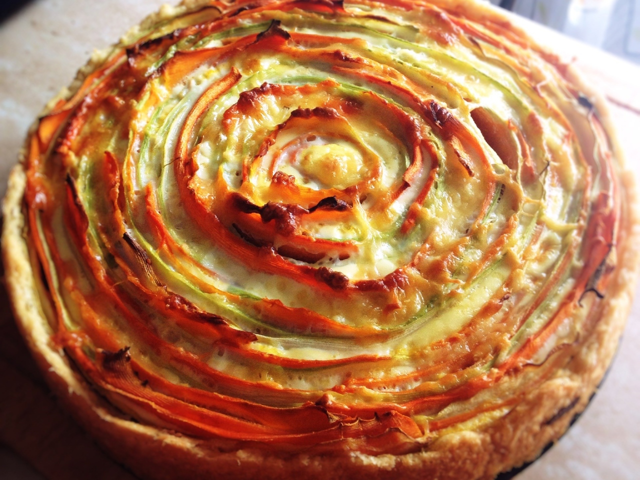 Layered Tart with Carrots and Zucchini in Cream Sauce
