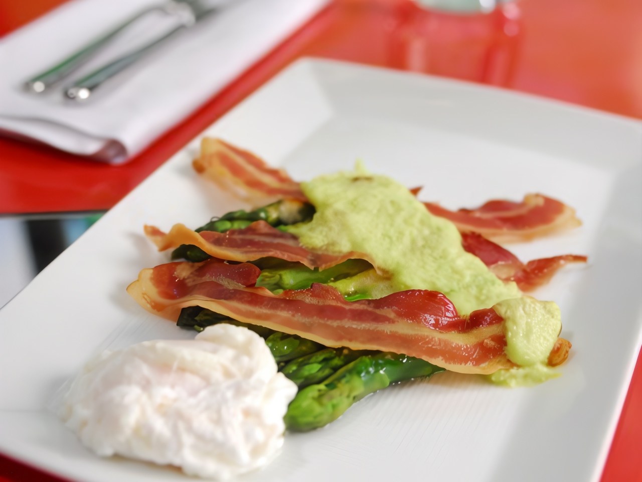 Asparagus Baked with Parmesan, Poached Eggs, and Prosciutto