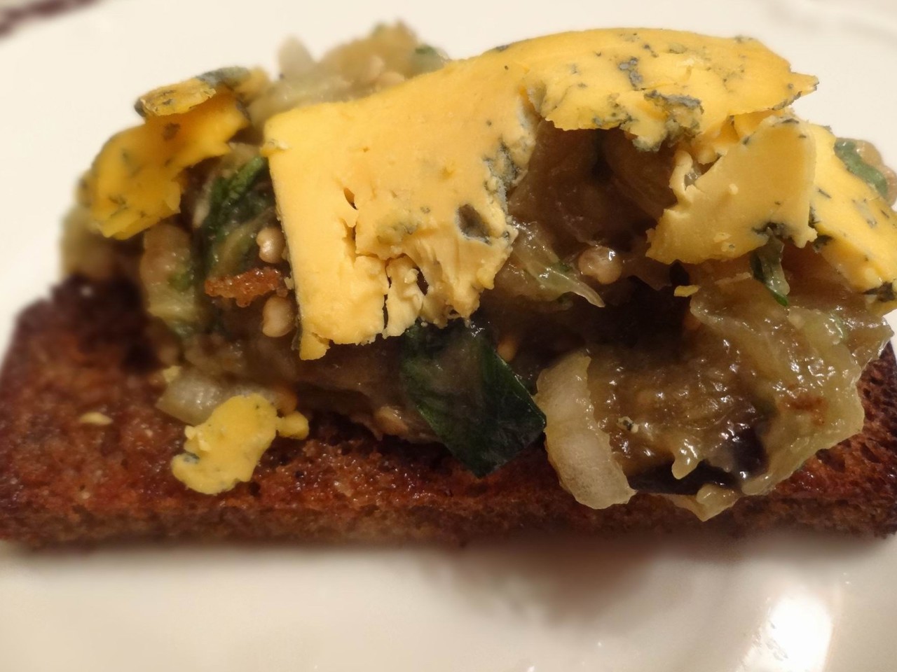 Mediterranean Eggplant Caviar with Cheese on Black Bread Toasts