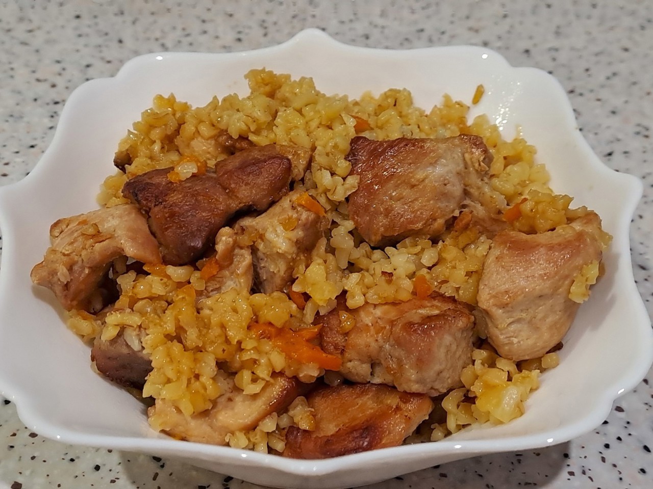 Pork Neck with Bulgur in the Oven