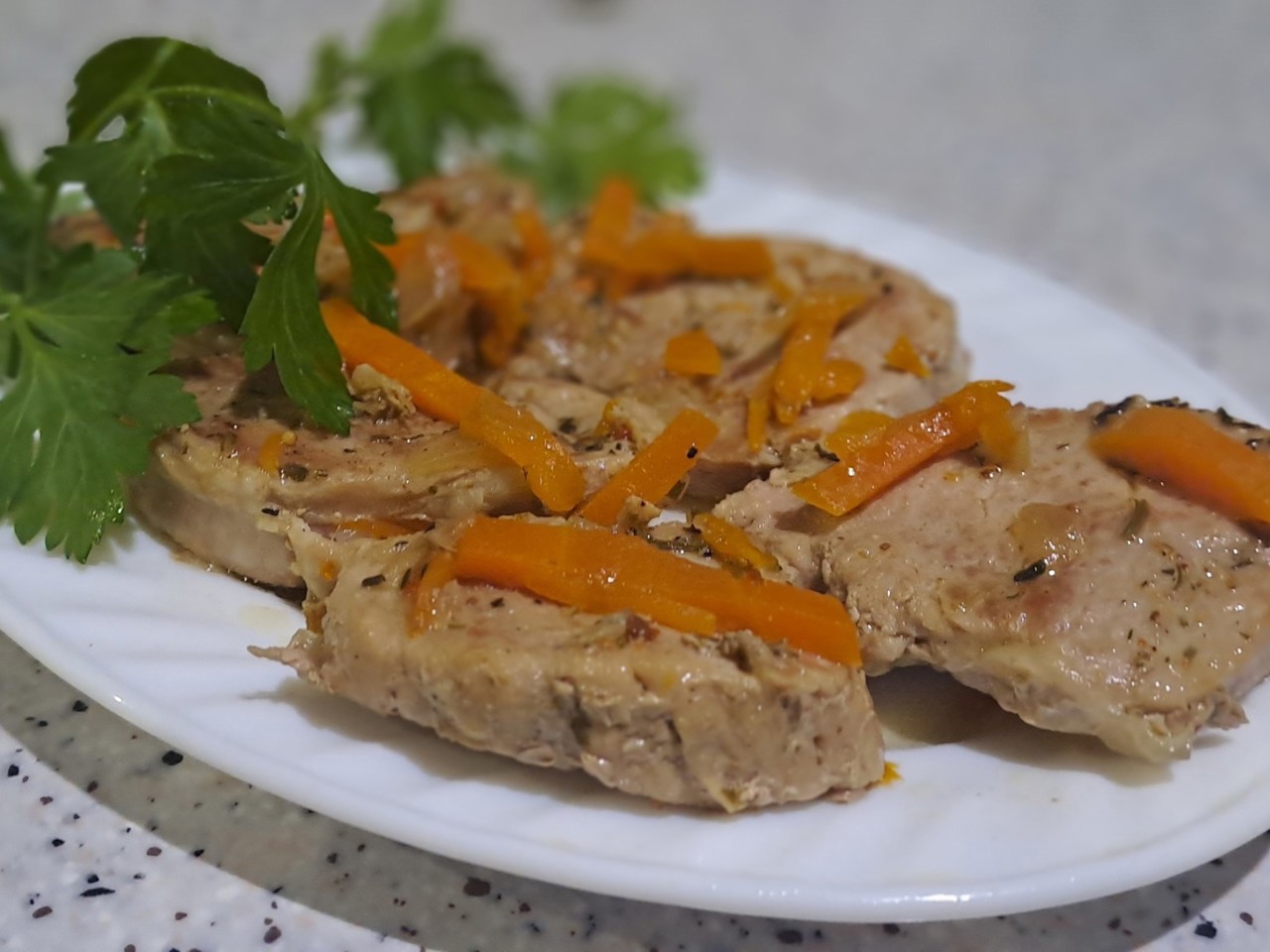 Pork Tenderloin in a Skillet with Onions and Carrots