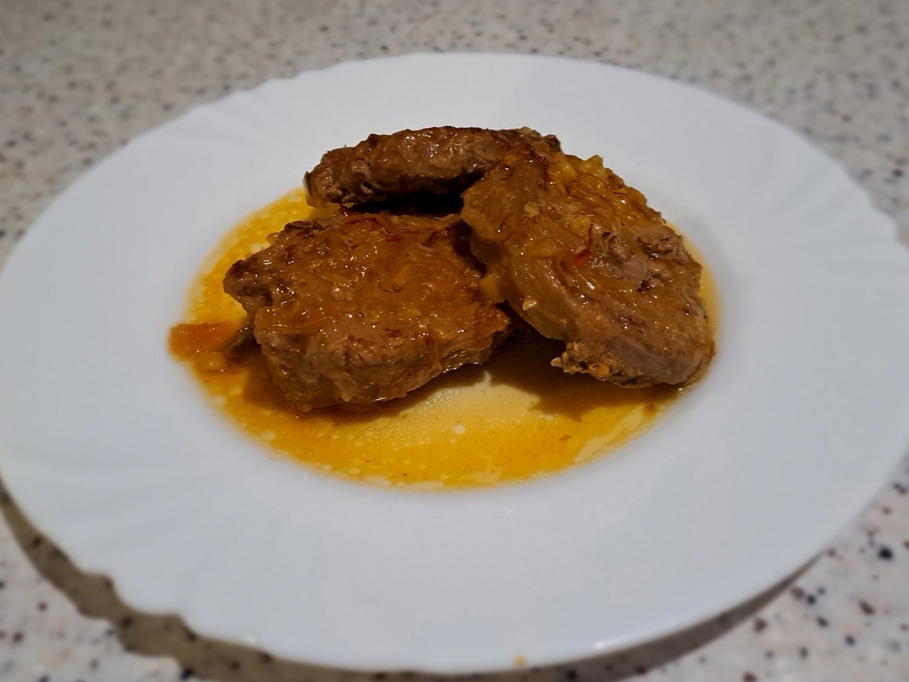 Pork Tenderloin in a Skillet with Saffron and Lemon Juice