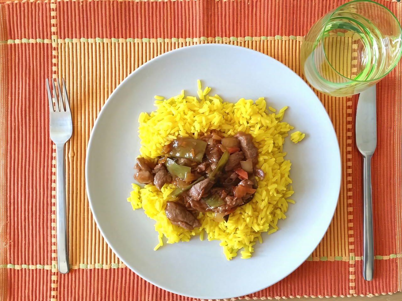 Pork in Sweet and Sour Sauce with Pineapples and Rice