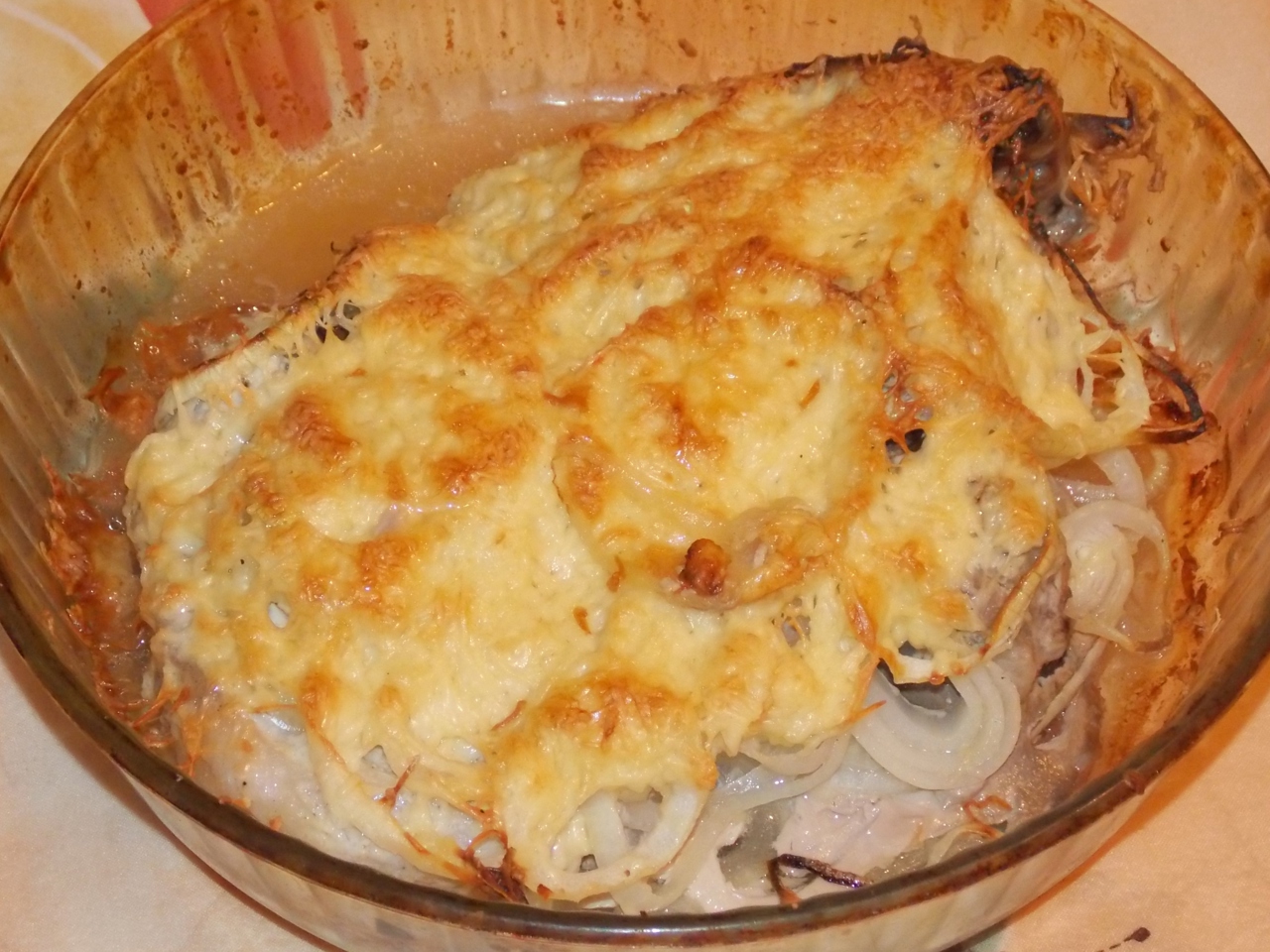 Pork Baked with Onions and Cheese
