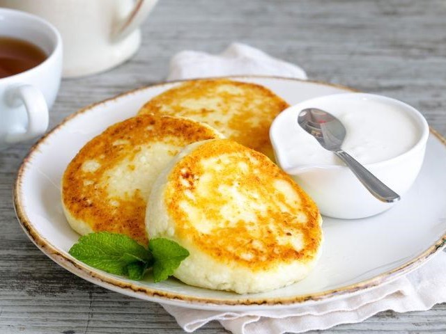 Cheese Pancakes with Sour Cream and Orange Zest