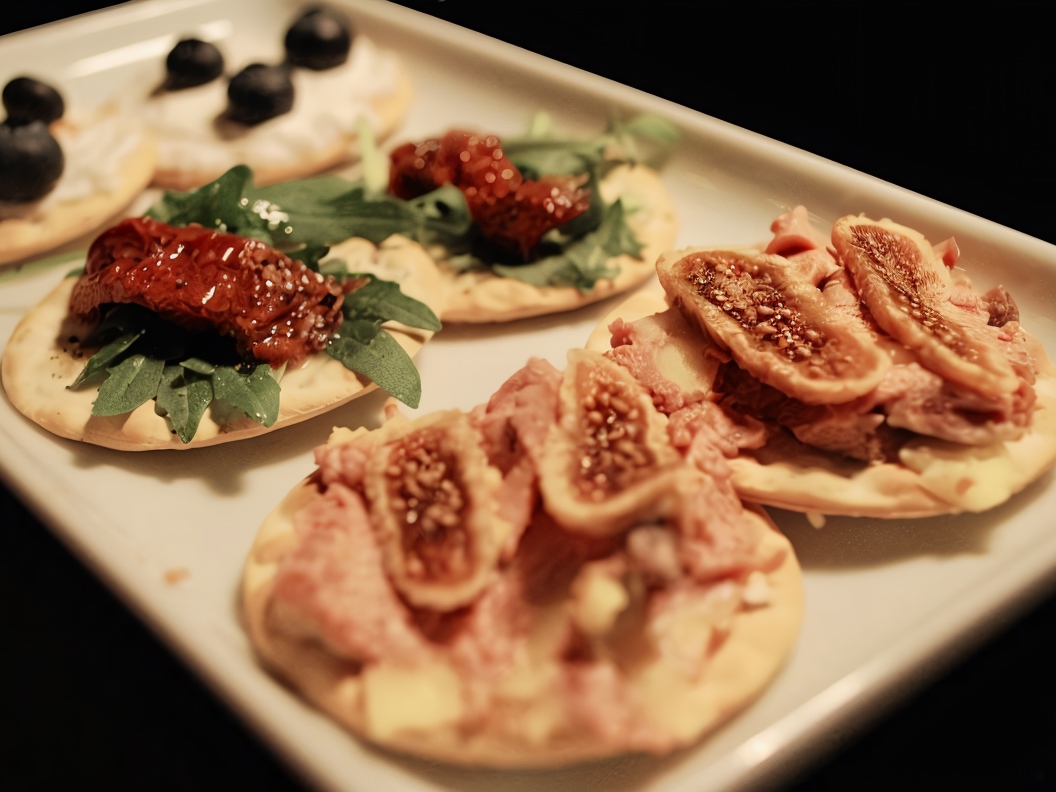 Tapas with Foie Gras, Sun-Dried Tomatoes, and Goat Cheese
