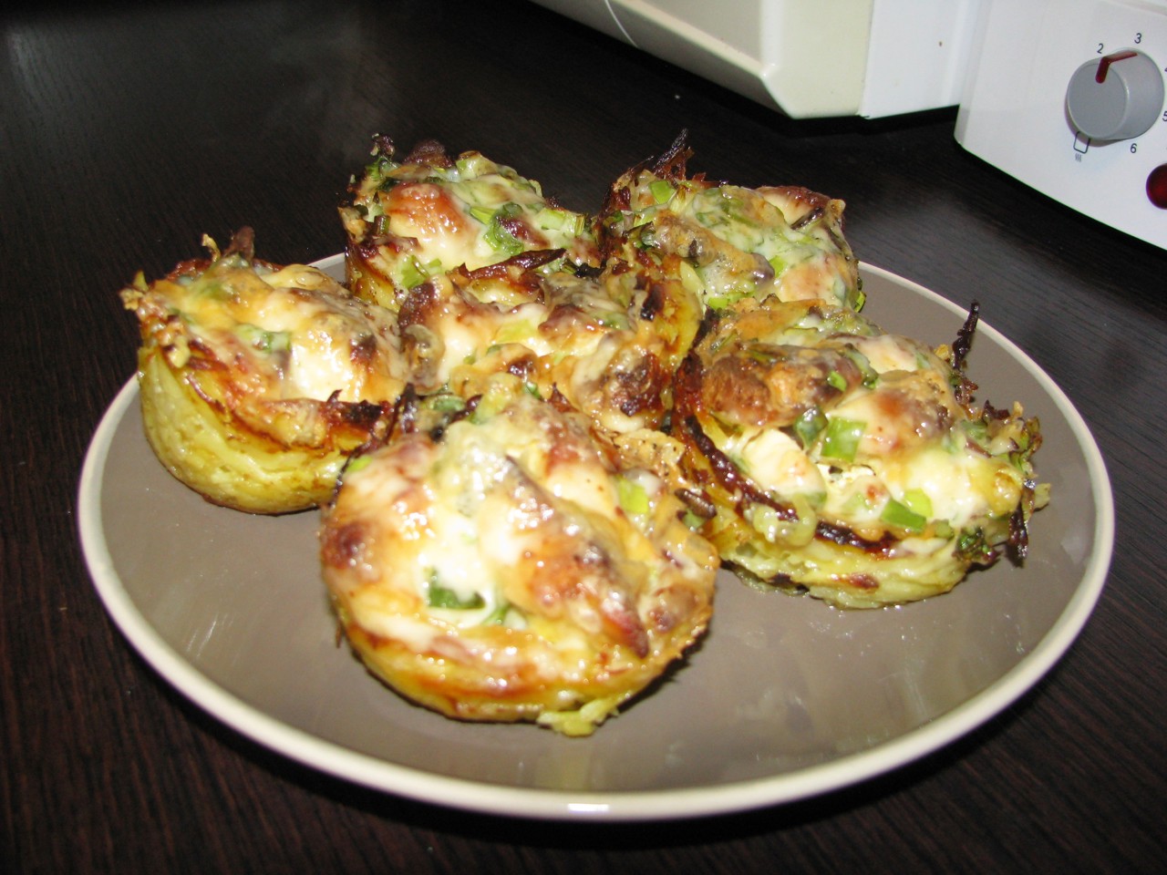 Potato Tartlets with Chicken Fillet in Garlic-Cheese Sauce