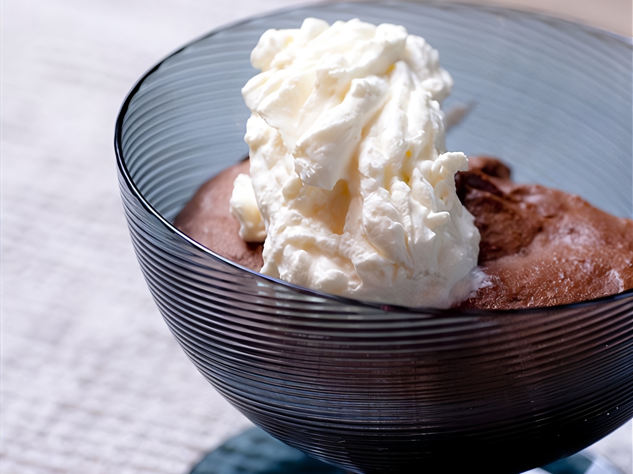 Warm Chocolate Puddings with Whipped Cream