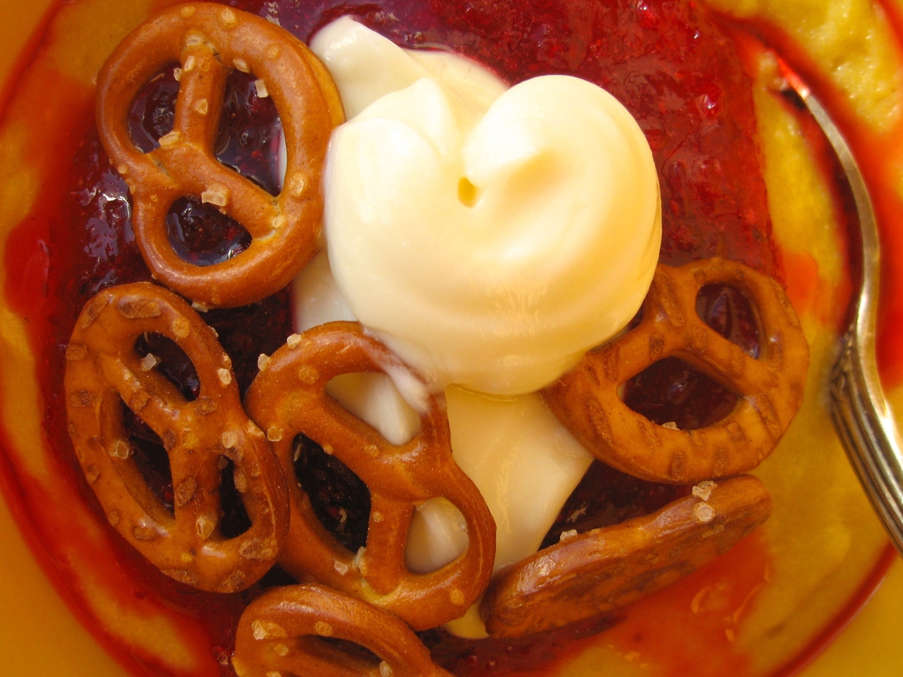 Pumpkin Semolina Porridge with Lingonberry Coulis and Salty Pretzel